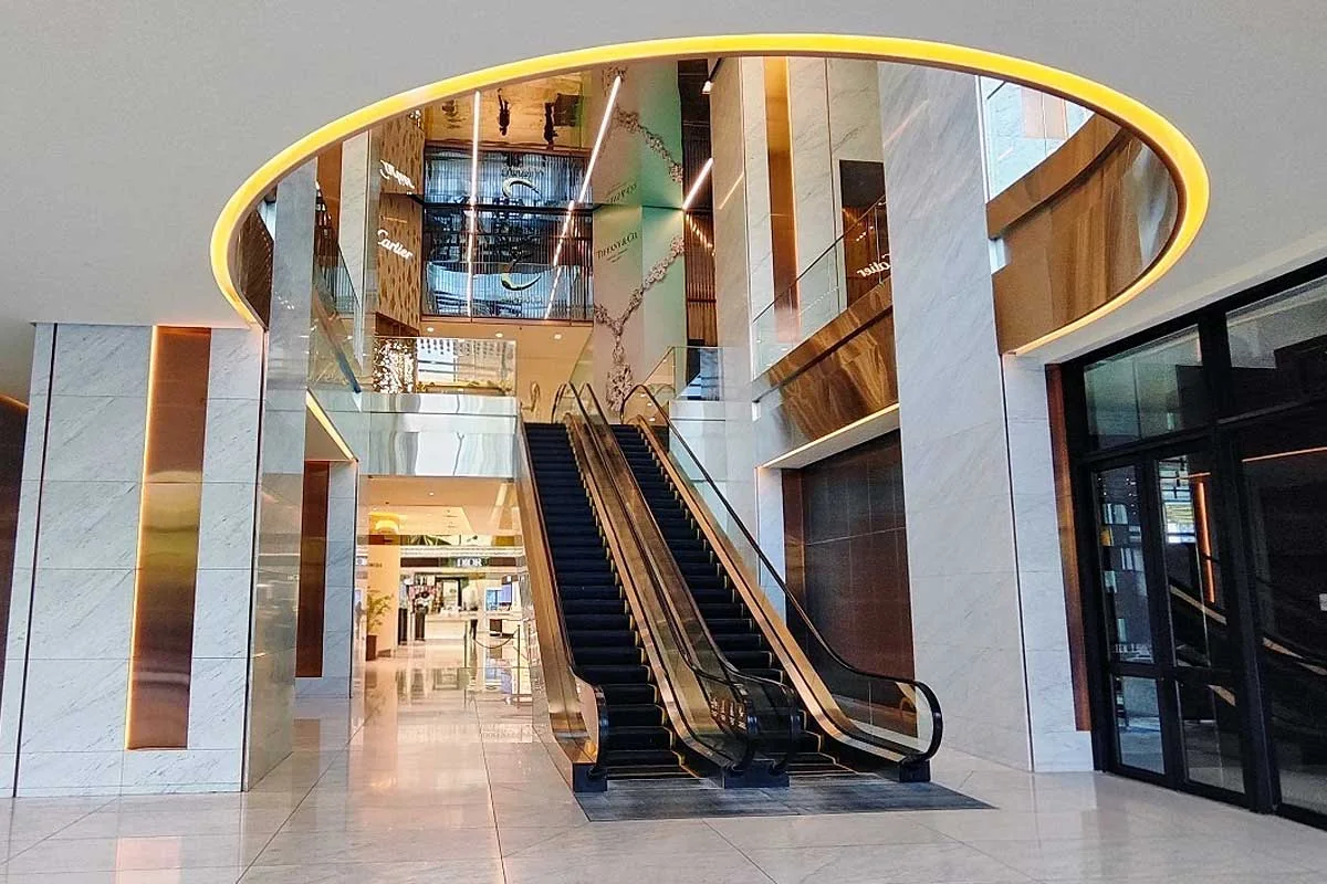 Interior escalators linking floors in Emporium Tower